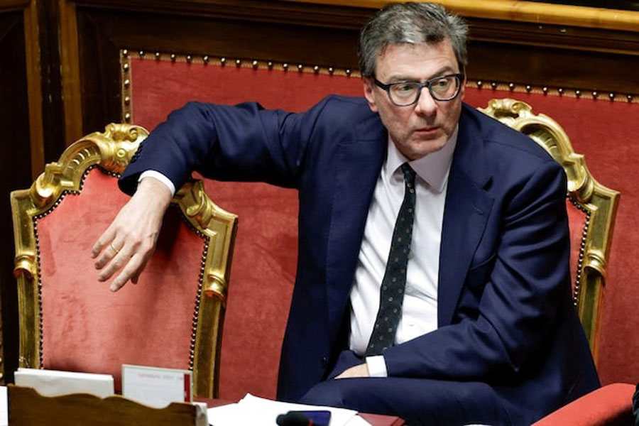 Italy's Economy Minister Giancarlo Giorgetti looks on, as Italy's Prime Minister Giorgia Meloni appears at the upper house of the Parliament in Rome, ahead of a European Union leaders' summit, in Rome, Italy, March 18, 2025.