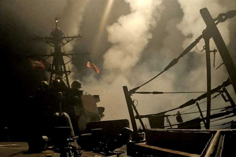 A ship fires missiles at an undisclosed location, after US President Donald Trump launched military strikes against Yemen's Iran-aligned Houthis on Saturday over the group's attacks against Red Sea shipping, in this screengrab obtained from a handout video released on March 15, 2025 — US Central Command/Handout via REUTERS/File