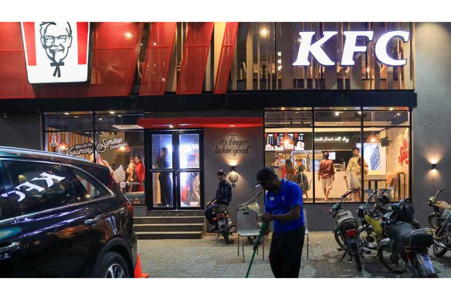A worker clears the floor at a KFC fast food outlet, which was attacked and vandalised during an anti-Israel protest last week, in Karachi, Pakistan Apr 17, 2025.
