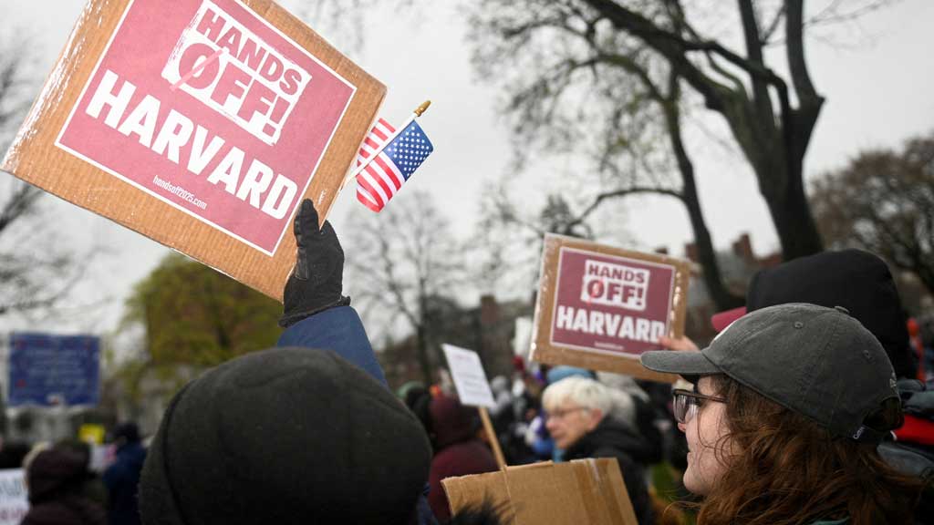 Demonstrators rally on Cambridge Common in a protest organized by the City of Cambridge calling on Harvard leadership to resist interference at the university by the federal government in Cambridge, Massachusetts, US April 12, 2025. REUTERS