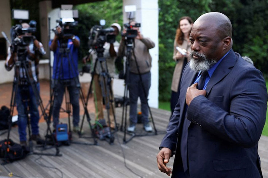 Democratic Republic of Congo's former President Joseph Kabila leaves after briefing memebrs of the media, following talks with South Africa's former President Thabo Mbeki at the Thabo Mbeki Foundation in Johannesburg, South Africa, March 18, 2025.