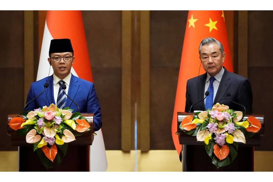 Indonesian Foreign Minister Sugiono and Chinese Foreign Minister Wang Yi attend a press briefing after the first meeting of China-Indonesia joint foreign and defence ministerial dialogue at the Diaoyutai State Guest House on Apr 21, 2025 in Beijing, China.