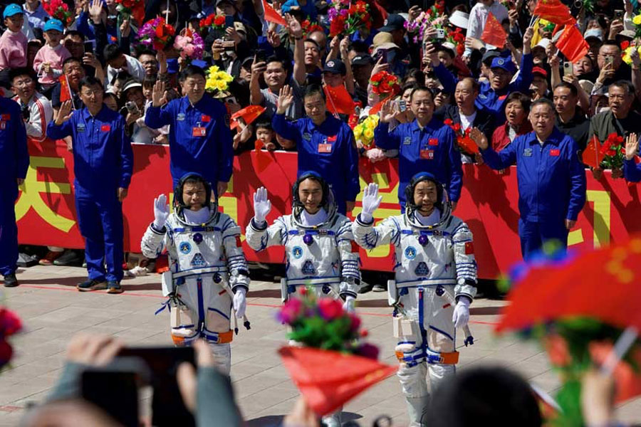 Astronauts Chen Dong, Chen Zhongrui and Wang Jie attend a see-off ceremony for the Shenzhou-20 spaceflight mission at Jiuquan Satellite Launch Centre near Jiuquan, Gansu province, China Apr 24, 2025.