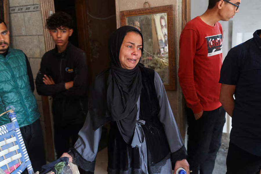 A Palestinian woman reacts at the site of an Israeli strike on a house, in Gaza City on April 24, 2025 — Reuters photo