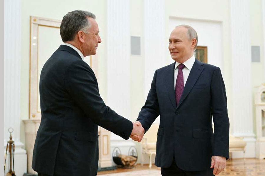 Russian President Vladimir Putin welcomes US President Donald Trump's envoy Steve Witkoff during a meeting in Moscow, Russia, April 25, 2025.