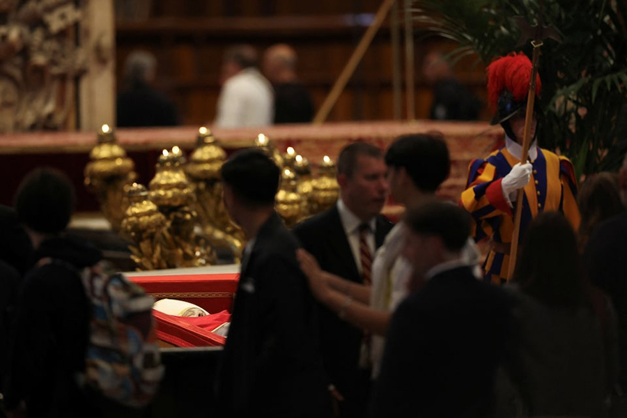 People pay their respects to Pope Francis inside St. Peter's Basilica, as Pope Francis lies in state, at the Vatican on April 25, 2025 — Reuters photo