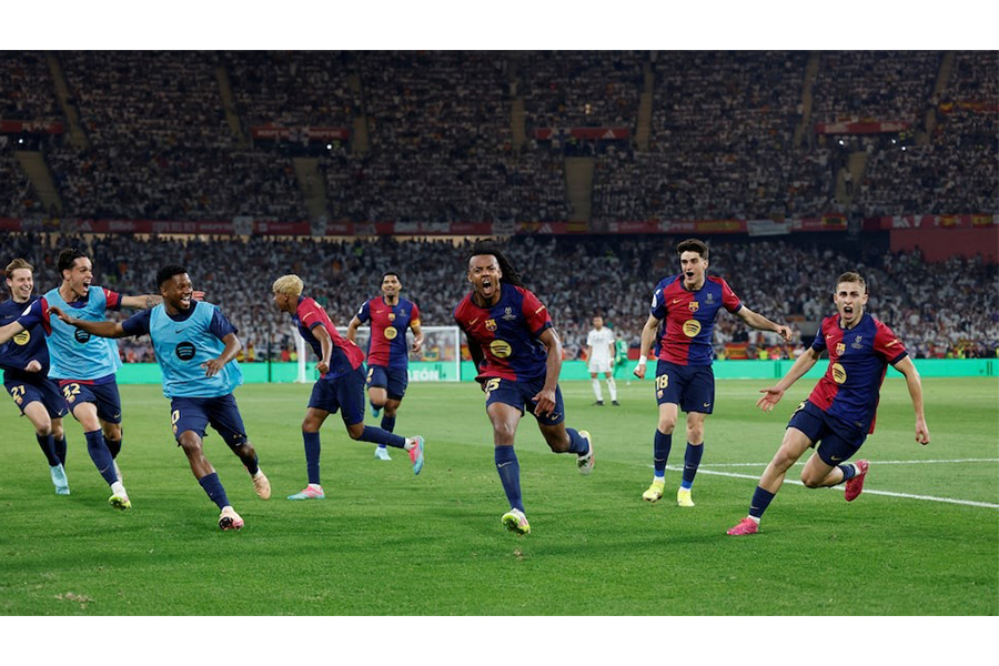 FC Barcelona's Jules Kounde celebrates with teammates after scoring their third goal during the Copa del Rey final against Real Madrid at Estadio de La Cartuja in Seville, Spain on April 27, 2025 — Reuters photo