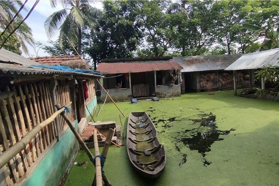 Photo shows a submerged homestead in Manirampur upazila of Jashore district- FE Photo