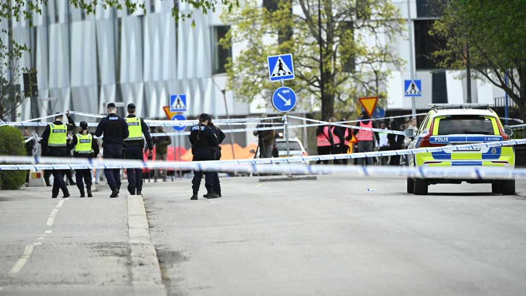 Police officers work at the scene where several people were injured after a series of loud bangs that indicated gunfire, according to police, at Vaksala Square in Uppsala, Sweden, April 29, 2025. TT News Agency/Fredrik Sandberg via REUTERS