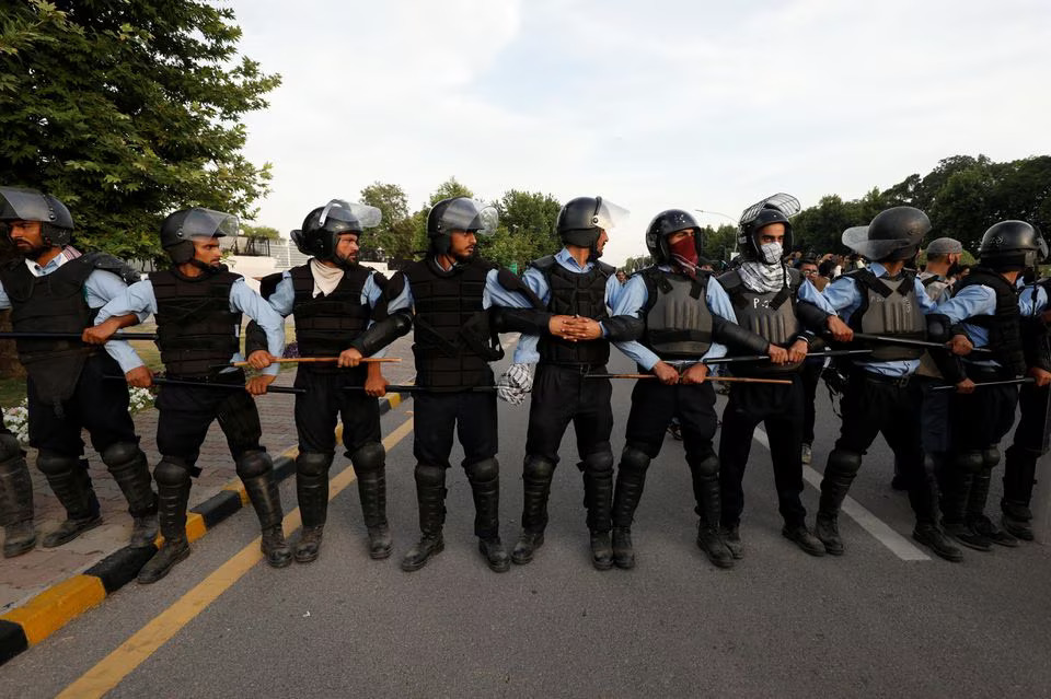 Police officers stand in a position to stop the supporters of Pakistan's former Prime Minister, Imran Khan, as he appeared before the Supreme Court in Islamabad, Pakistan on May 11, 2023 — Reuters file photo
