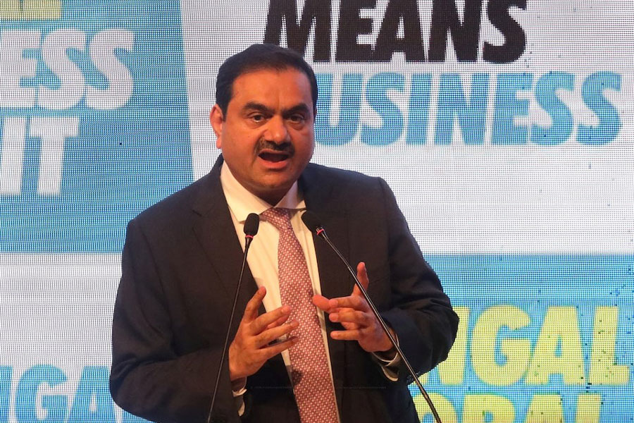 Indian billionaire Gautam Adani addresses delegates during the Bengal Global Business Summit in Kolkata, India April 20, 2022.