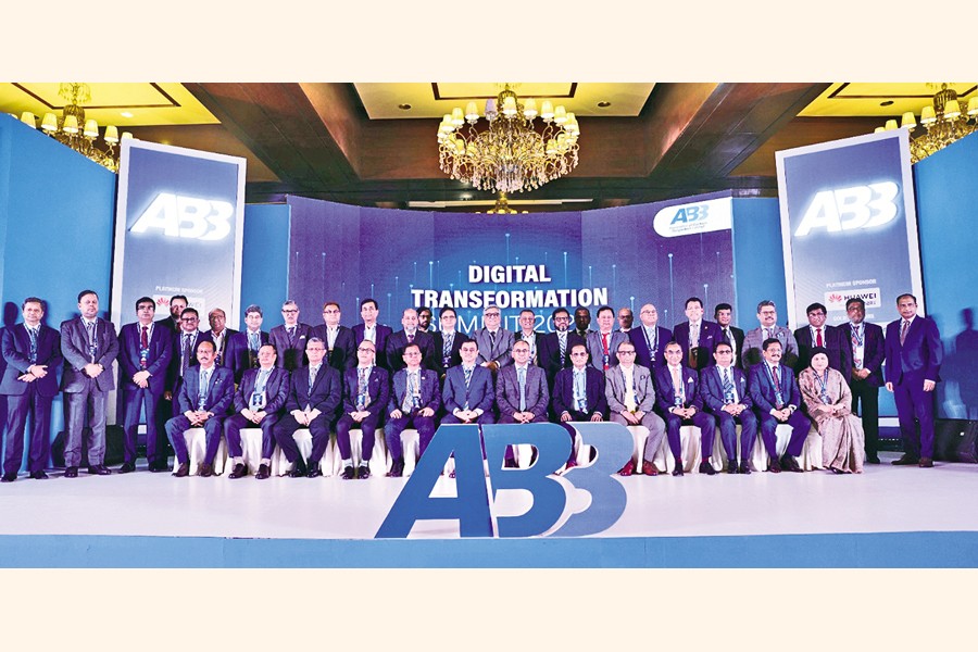 Managing director & chief executive officers of different banks pose at the inaugural session of a two-day summit titled 'Banking on Digital Transformation' in the city on Wednesday. Bangladesh Bank Governor Abdur Rouf Talukder was present as the chief guest at the event organised by the Association of Bankers Bangladesh Limited (ABB). — FE photo
