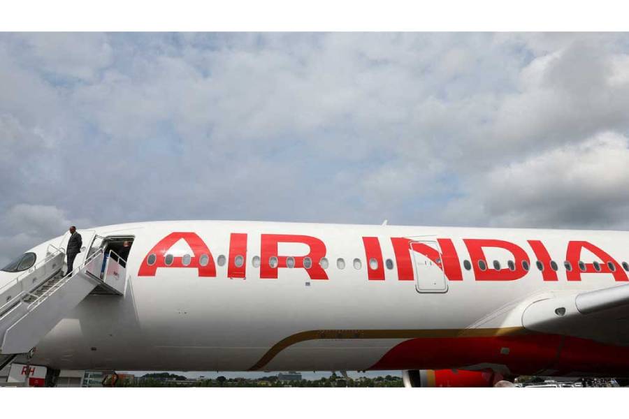Branding for Air India is seen on an Airbus A350-900 at the Farnborough International Airshow, in Farnborough, Britain, Jul 24, 2024.