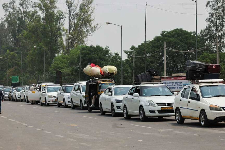 Pakistani citizens sit in cars, waiting to go to Pakistan at the Attari-Wagah border crossing with Pakistan, near Amritsar, India, May 1, 2025. India has suspended visa services to Pakistani nationals with immediate effect following the Pahalgam attack in south Kashmir.
