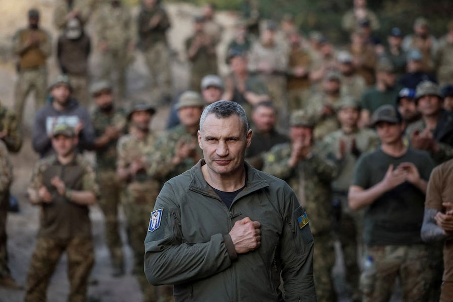 Kyiv Mayor Vitali Klitschko greets servicemen of the Svoboda (Freedom) battalion from the elite Storm Brigade "Rubizh" of the National Guard of Ukraine before an award ceremony for fighters, who have recently returned from the frontline in the Bakhmut area of Donetsk region, amid Russia's attack on Ukraine, in Kyiv region, Ukraine April 11, 2024.