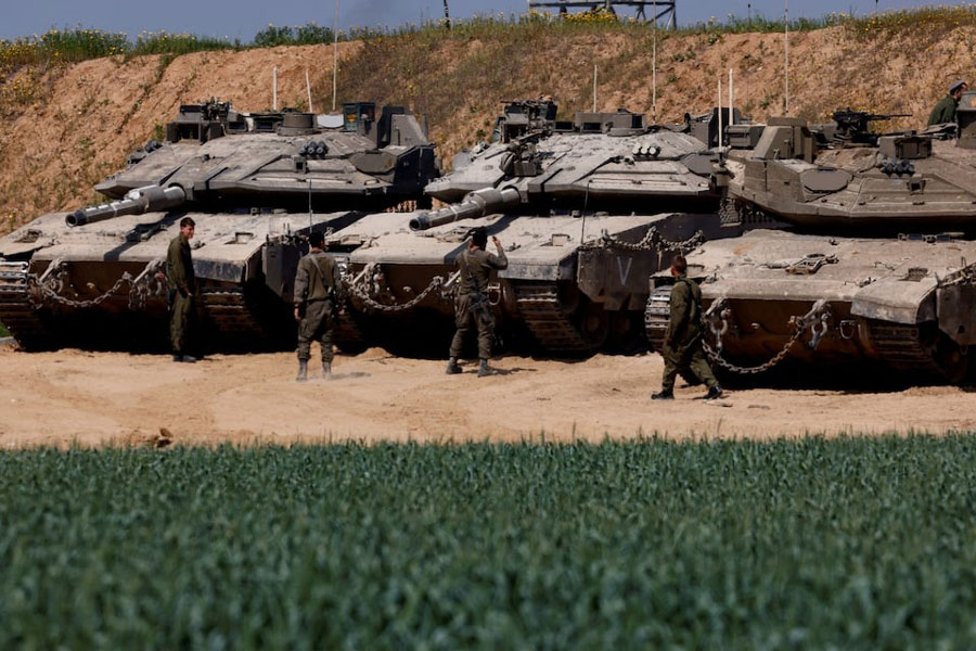 Israeli tanks are positioned near the Israel-Gaza border, in Israel, March 18, 2025.