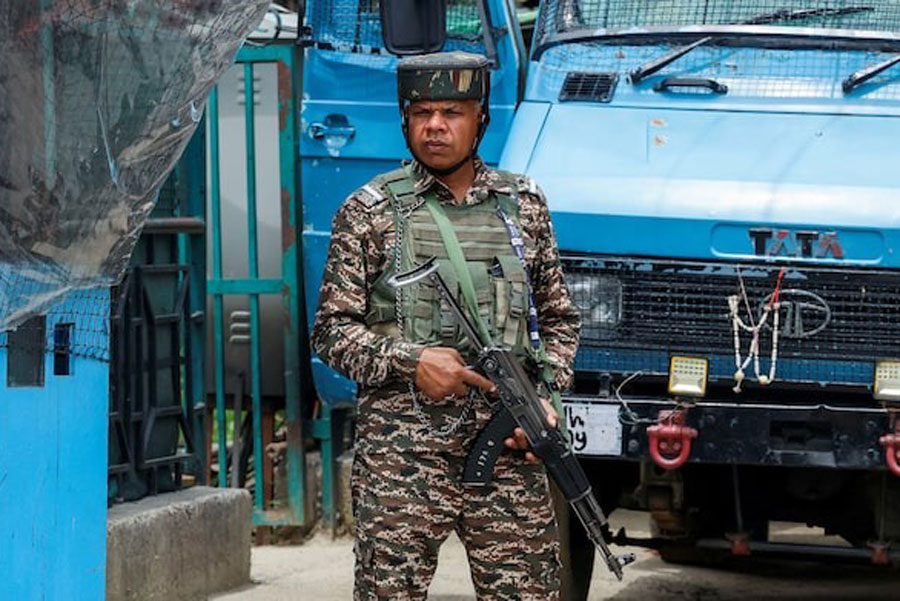 An Indian security force personnel stands guard on a street, following the Pahalgam attack in south Kashmir, in Srinagar, May 5, 2025.