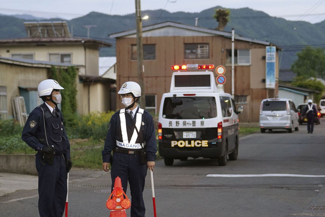 Police officers stand near the scene of a stabbing and shooting incident in Nakano, Nagano Prefecture, Japan, in this photo taken by Kyodo on May 25, 2023. Mandatory credit Kyodo via REUTERS
