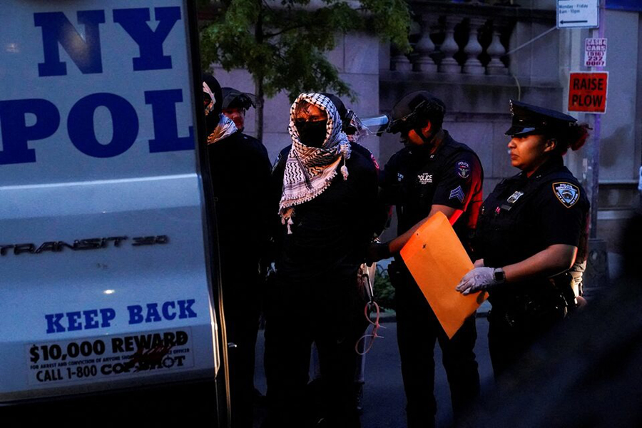 Pro-Palestinian protesters are loaded into NYPD buses after being detained by public safety officers, following a protest at Butler Library on the campus of Columbia University in New York, US on May 7, 2025 — Reuters photo
