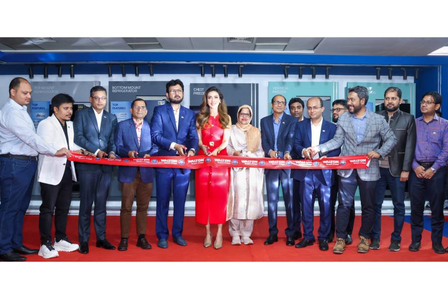 Renowned film actor Amin Khan, Walton Refrigerator's Brand Ambassador Bidya Sinha Min and other senior officials of the company pose for a photograph while unveiling new models of refrigerator at a programme titled 'Walton Mega Lunch 2025'.
