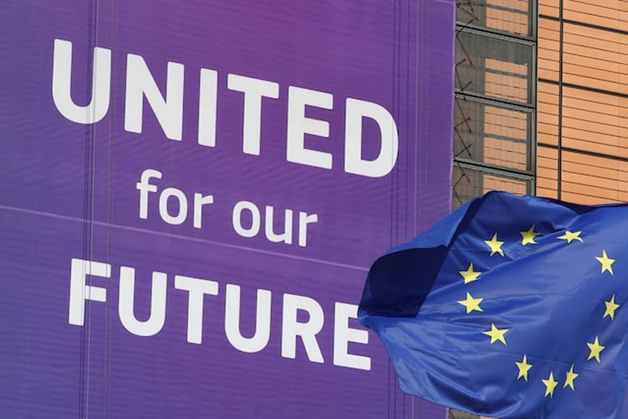 A European Union flag flutters outside the European Commission headquarters in Brussels, Belgium, April 9, 2025.