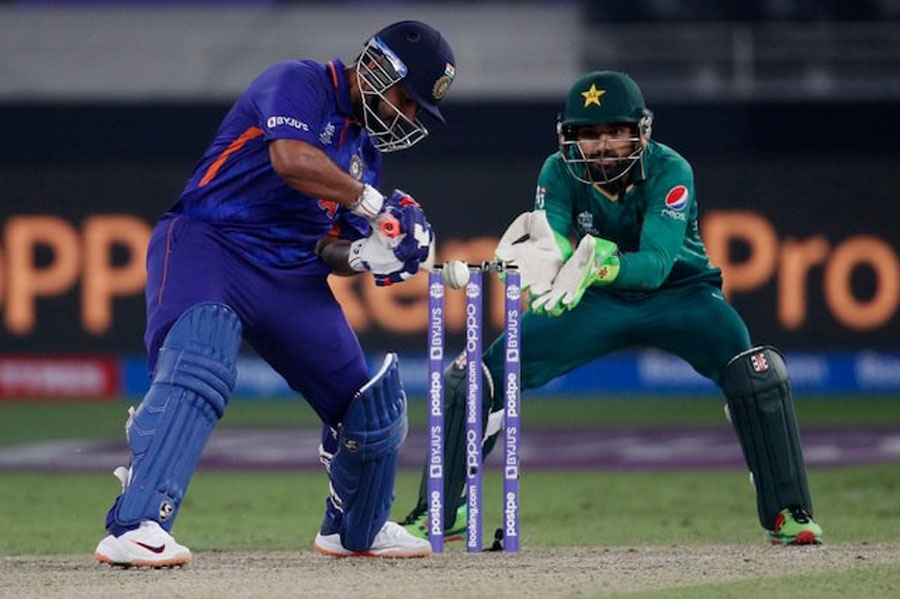 Cricket - ICC Men's T20 World Cup 2021 - Super 12 - Group 2 - India v Pakistan - Dubai International Stadium, Dubai, United Arab Emirates - October 24, 2021 India's Rishabh Pant hits a four.