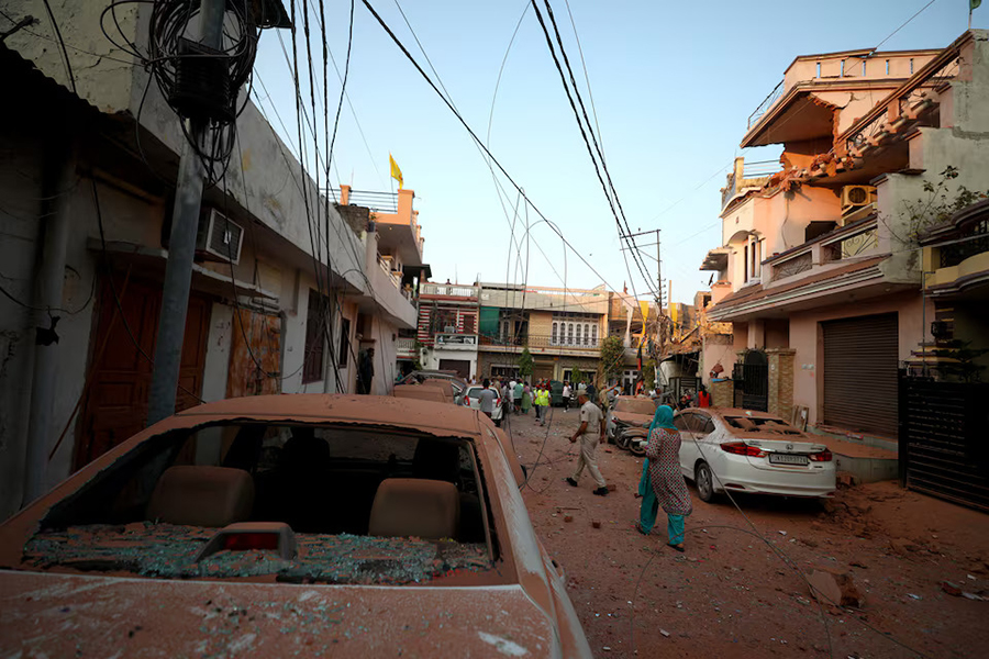 Damaged vehicles are seen in the neighbourhood, following Pakistan's military operation against India, in Rehari, Jammu on May 10, 2025 — Reuters photo
