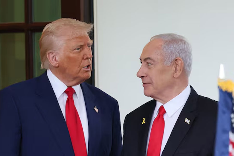 US President Donald Trump welcomes Israeli Prime Minister Benjamin Netanyahu at the entrance of the White House in Washington, DC, US, April 7, 2025.