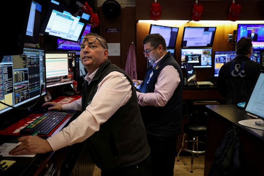 Traders work on the floor at the New York Stock Exchange (NYSE) in New York City, US, May 7, 2025.