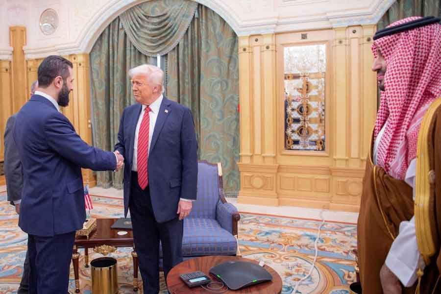 US President Donald Trump meets with Syrian President Ahmed al-Sharaa in Riyadh, Saudi Arabia, in this handout released on May 14, 2025.