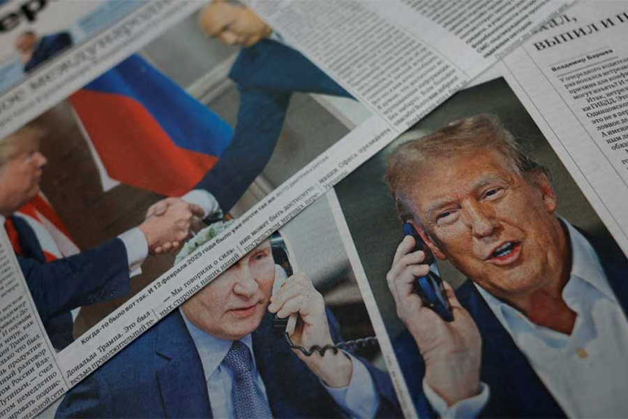 Daily newspapers with covers, dedicated to the recent phone call of Russian President Vladimir Putin and US President Donald Trump, are laid out at a newsstand in a street in Moscow, Russia on February 13, 2025 — Reuters/File