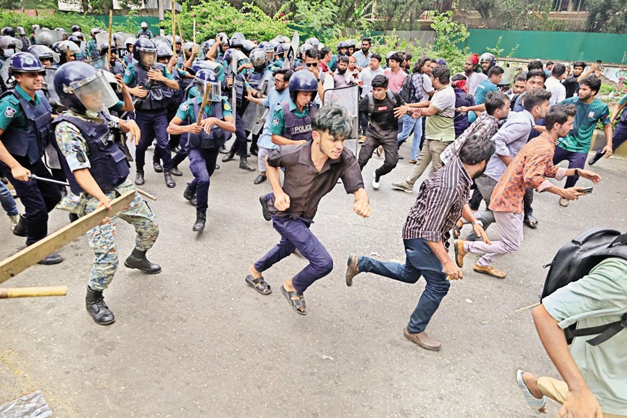 Police baton-charge students of Jagannath University in Dhaka's Kakrail on Wednesday as they attempted to march to the State Guest House Jamuna to press home their three-point demand, including the introduction of a housing allowance