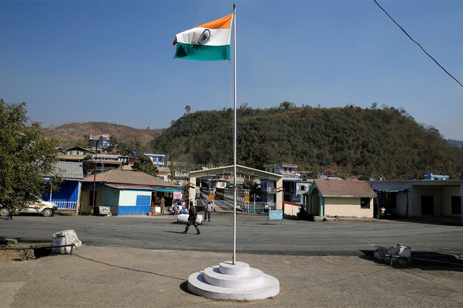 An Indian national flag flies next to an immigration check post on the India-Myanmar border in Zokhawthar village in Champhai district of India's northeastern state of Mizoram, India on March 16, 2021 — Reuters/File