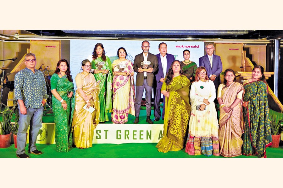 Feminist Green Action Award winners pose with crests at the award-giving ceremony hosted by ActionAid Bangladesh (AAB) at a city hotel on Wednesday .