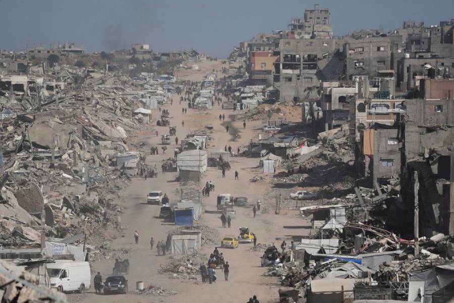 Displaced Palestinians fleeing Beit Lahia amid ongoing Israeli military operations in the Gaza Strip arrive in Jabalia, northern Gaza, on Friday, May 16, 2025.