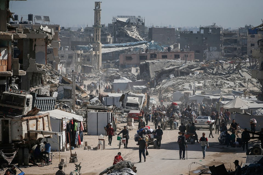 Palestinians make their way with belongings as they fled their homes, after Israeli air strikes, in the northern Gaza Strip on May 16, 2025 — Reuters photo