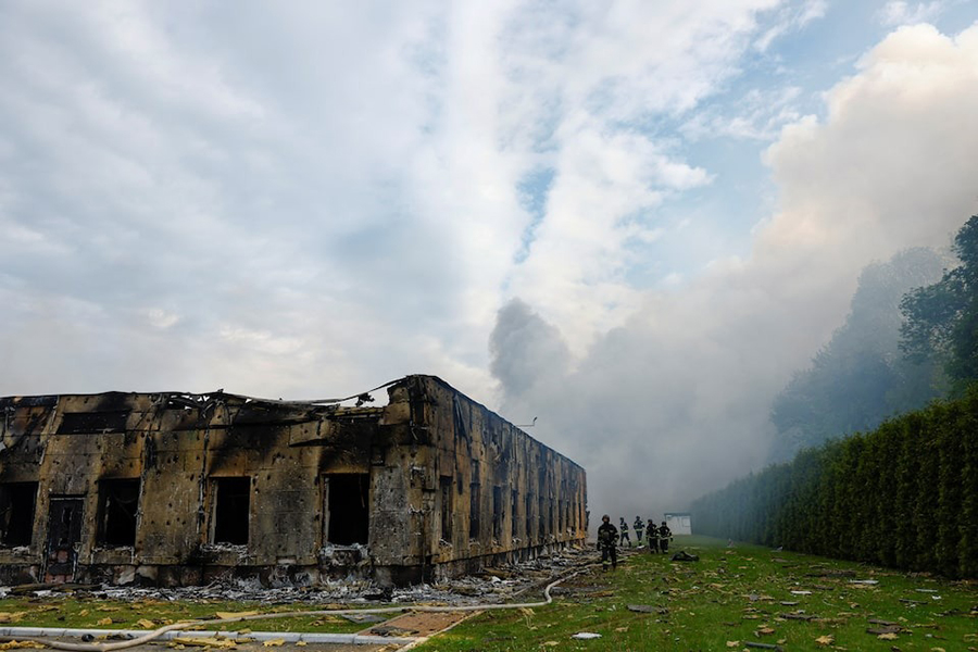 Firefighters work at the site of a private enterprise hit by a Russian drone strike, amid Russia's attack on Ukraine, outside of Kyiv, Ukraine on May 18, 2025 — Reuters photo