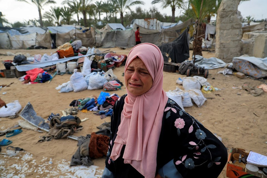 A Palestinian woman reacts at the site of an Israeli strike on a tent camp sheltering displaced people, in Khan Younis, southern Gaza Strip on May 18, 2025 — Reuters photo