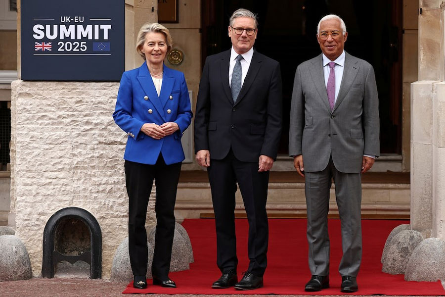 Britain's Prime Minister Keir Starmer poses with European Commission President Ursula von der Leyen and European Council President Antonio Costa as they arrive to attend the UK-EU Summit at Lancaster House in London on May 19, 2025.