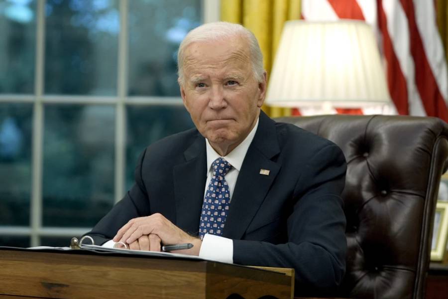 President Joe Biden speaks from the Oval Office of the White House in Washington, Sept. 30, 2024.