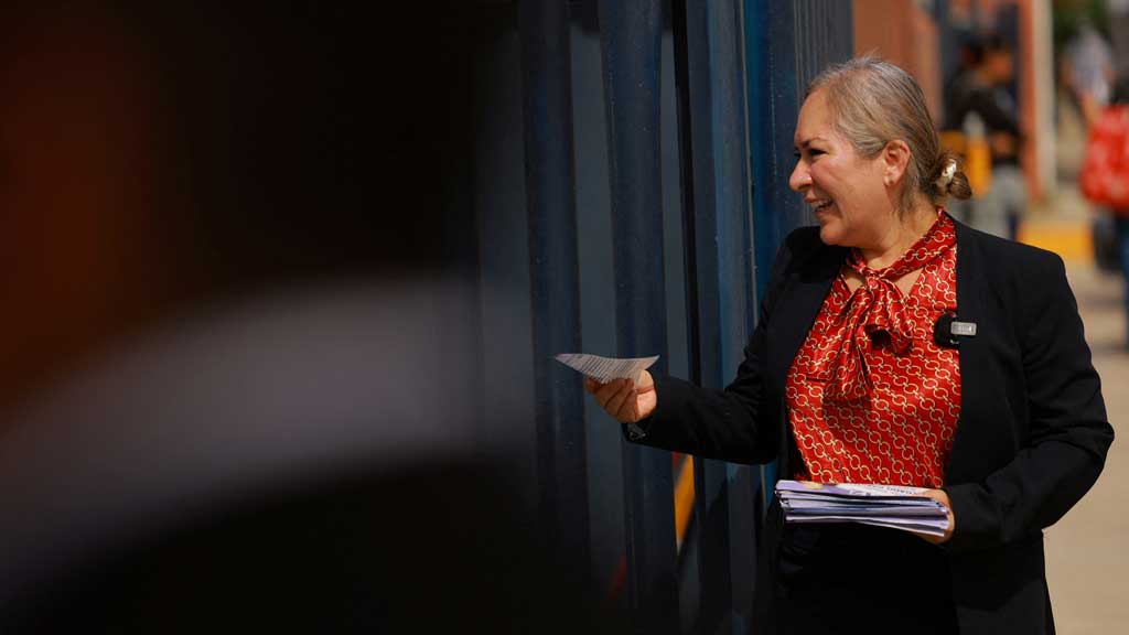 Silvia Delgado, former defence attorney for Sinaloa Cartel boss Joaquin "El Chapo" Guzman in 2016 and current candidate for criminal judge, distributes campaign materials ahead of Mexico's first judicial elections, to be held on June 1, in Ciudad Juarez, Mexico, May 12, 2025. REUTERS