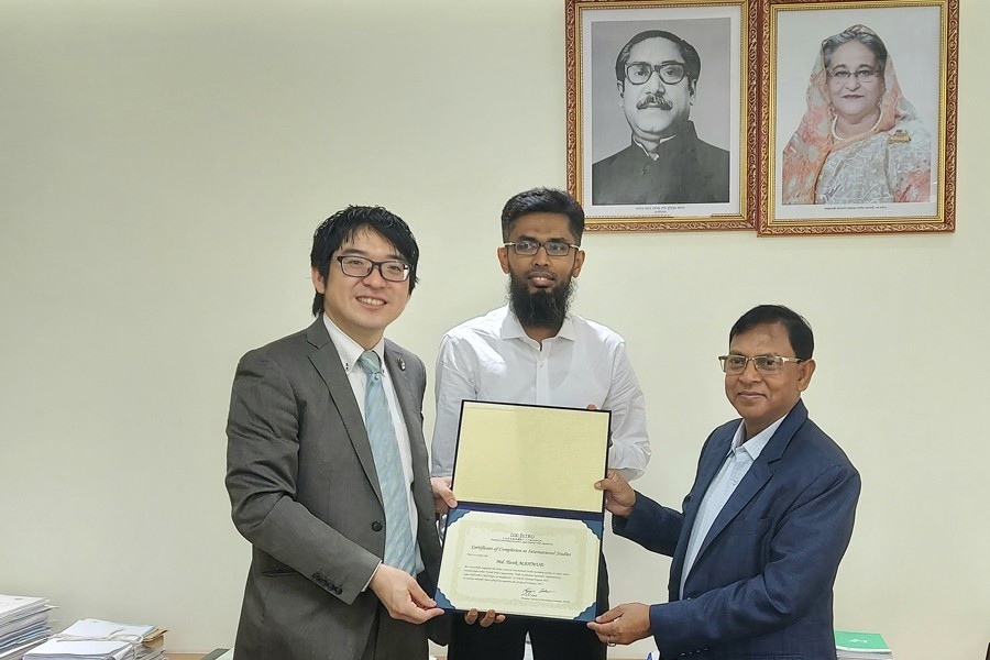 Country Representative of Japan External Trade Organization (JETRO) in Dhaka Yuji Ando, left, hands over the successful completion certificate of IDEAS Training Program 2022 to Md Tarek Mahmud, deputy director, Central Intelligence Cell of National Board of Revenue (NBR), middle, at NBR Bhaban in Dhaka on Monday, in presence of Abdul Mannan Shikder, member of NBR, right.