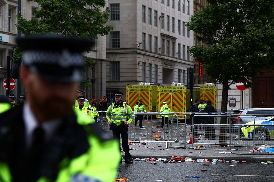 Emergency services at an incident involving a car and supporters during Liverpool’s Premier League Victory Parade in Liverpool, Britain on May 26, 2025 — Action Images via Reuters