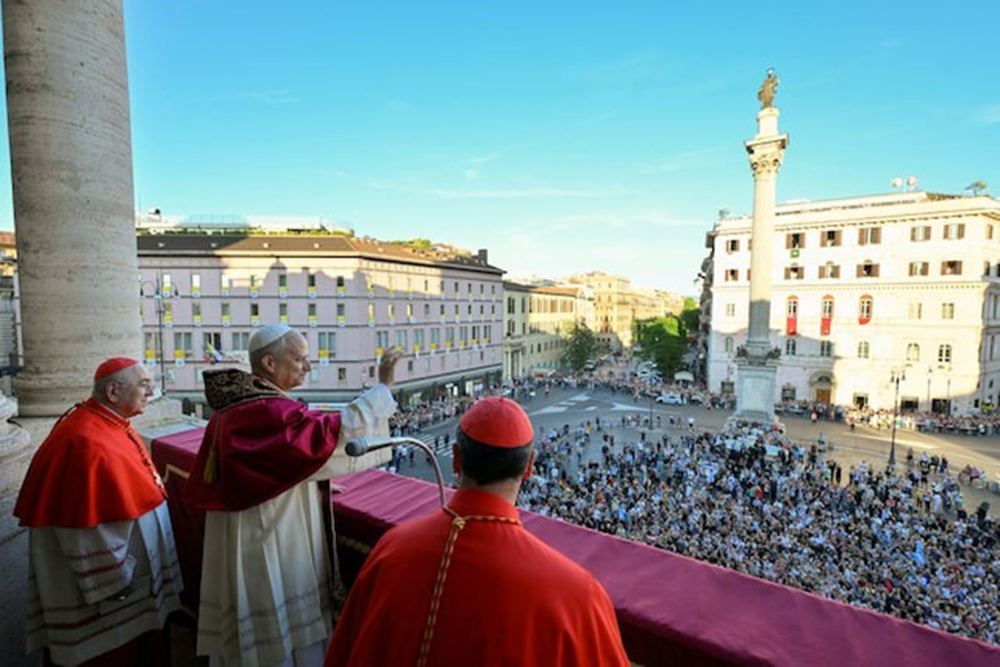 Pope Leo XIV waves to the faithful from the balcony of the Basilica di Santa Maria Maggiore (Basilica of Saint Mary Major) where Pope Francis is buried, in Rome, Italy on May 25, 2025 — Vatican Media/Handout via REUTERS/File