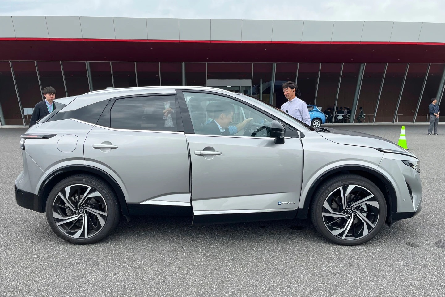 Reporters try out Nissan’s e-Power electrification technology on the current Qashqai model at the company’s Grandrive facility in Yokosuka, Japan, outside Tokyo, Monday, May 26, 2025. (AP Photo/Yuri Kageyama)