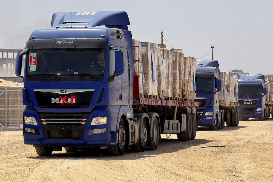 Trucks transport aid as Gaza Humanitarian Foundation said it has commenced operations to begin distribution of aid, in Rafah, in the southern Gaza Strip, May 26, 2025.