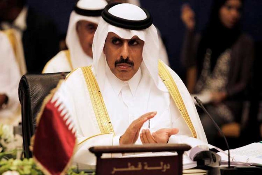 Qatar's central bank governor Sheikh Abdullah bin Saoud al-Thani claps during the 58th Gulf Cooperation Council (GCC) Central Bank Governors' annual meeting in Manama, Bahrain on September 18, 2013. - File photo