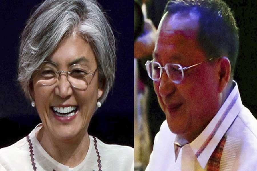South Korean Foreign Minister Kang Kyung-wha, left, and North Korean counterpart Ri Yong Ho — AP