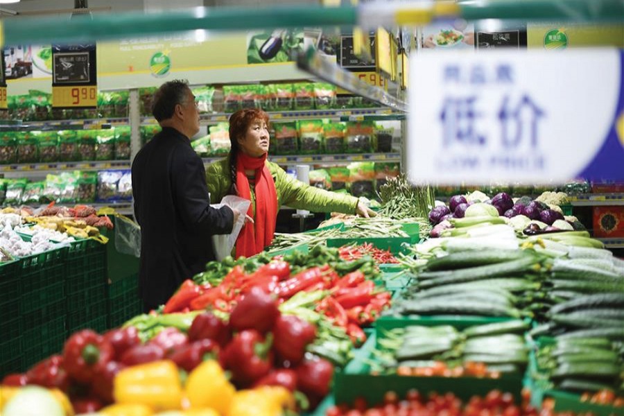 A kitchen market in China. — Xinhua file photo