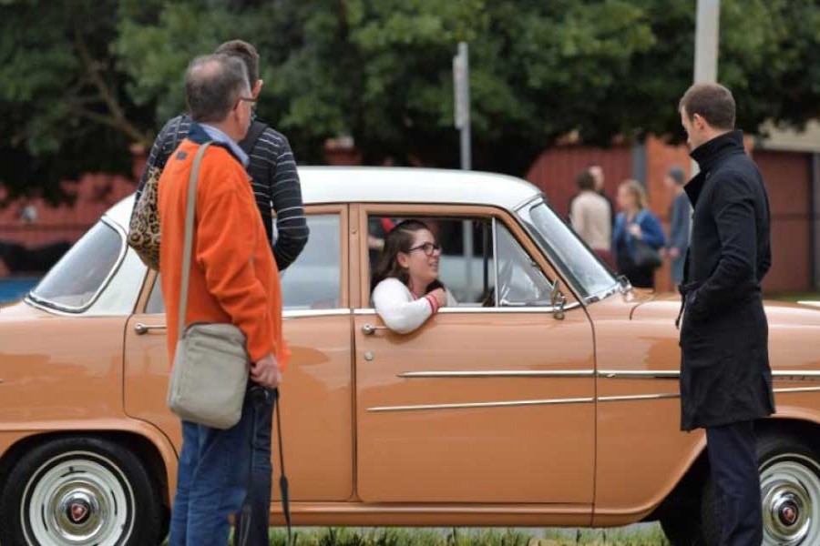 A Holden car fan sits in her car outside the Holden motor vehicle plant in Elizabeth, Australia, October 20, 2017 as their last Commodore vehicle officially rolls off the production line on Friday. - Reuters photo